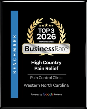 A plaque awarding the clinic a spot in the Top 3 Business Rate 2026